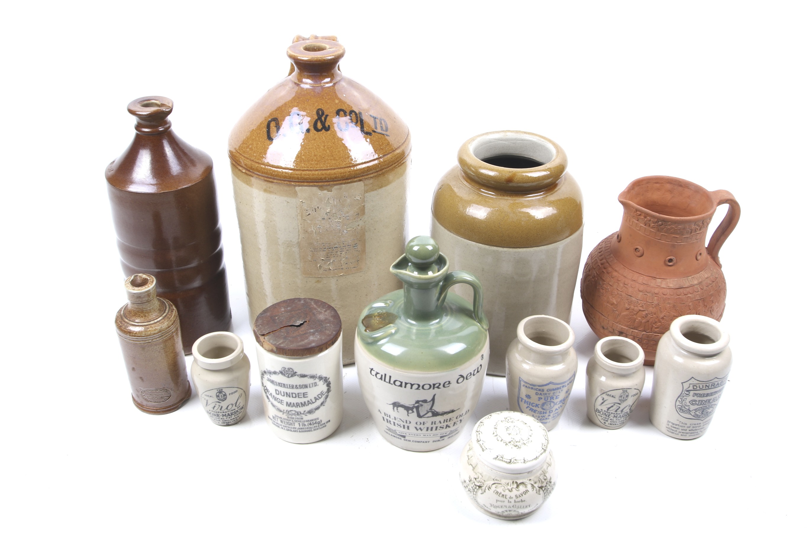 A collection of 19th century and later stoneware. Including a sale glazed flagon marked 'O.G.