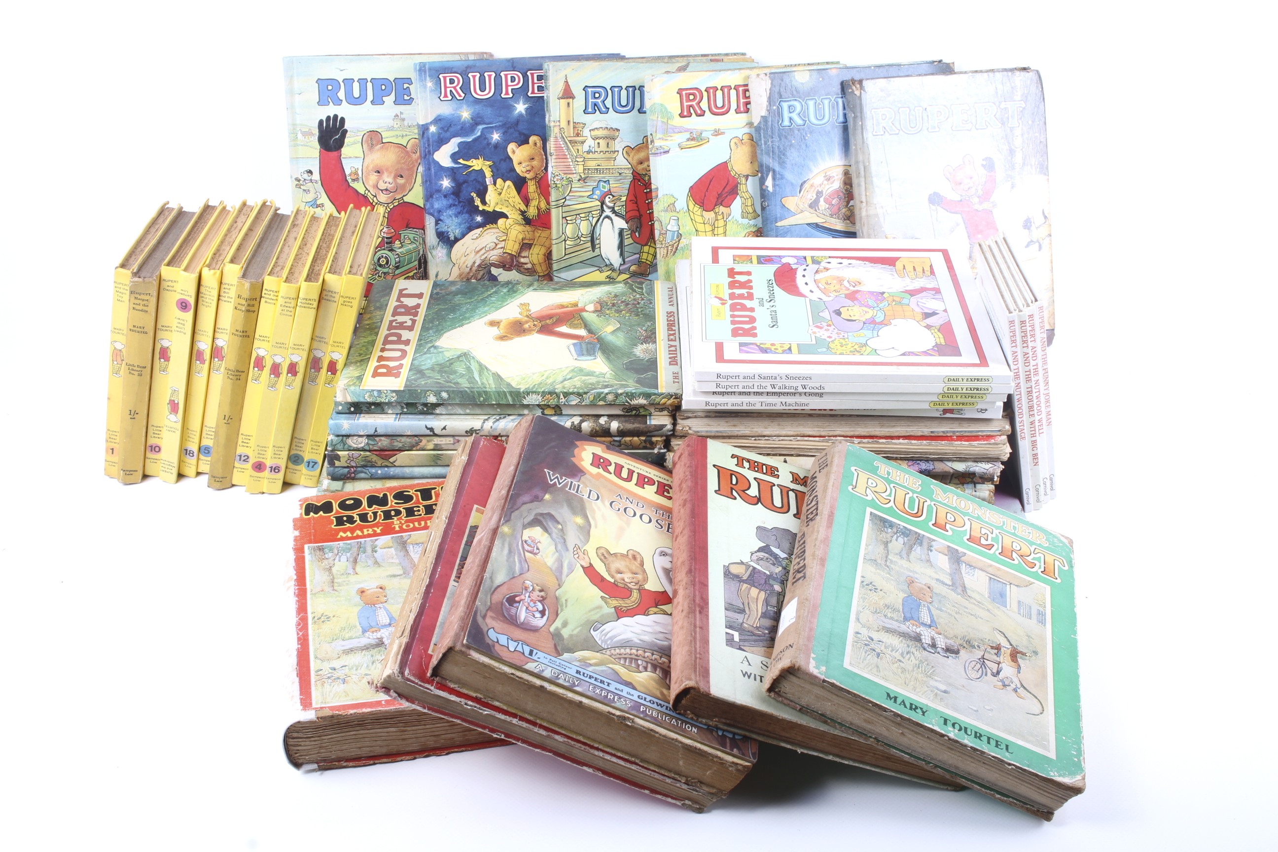 A large collection of vintage Rupert books dating back to the 1930s/40s.