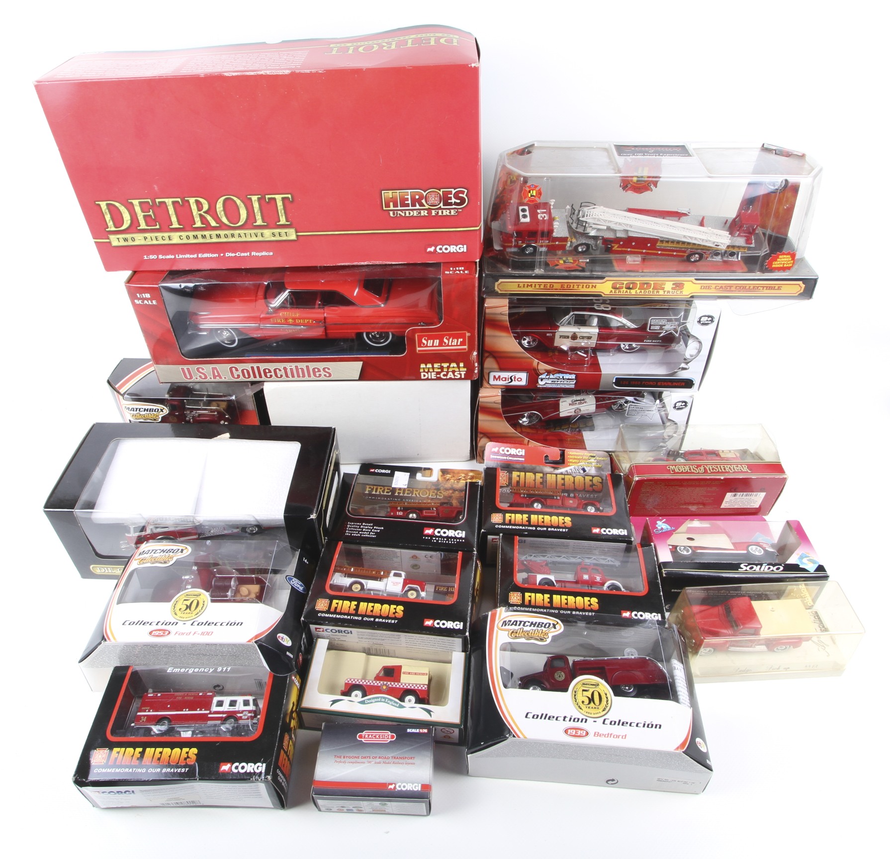 Collection of assorted die cast model fire engines and vehicles.
