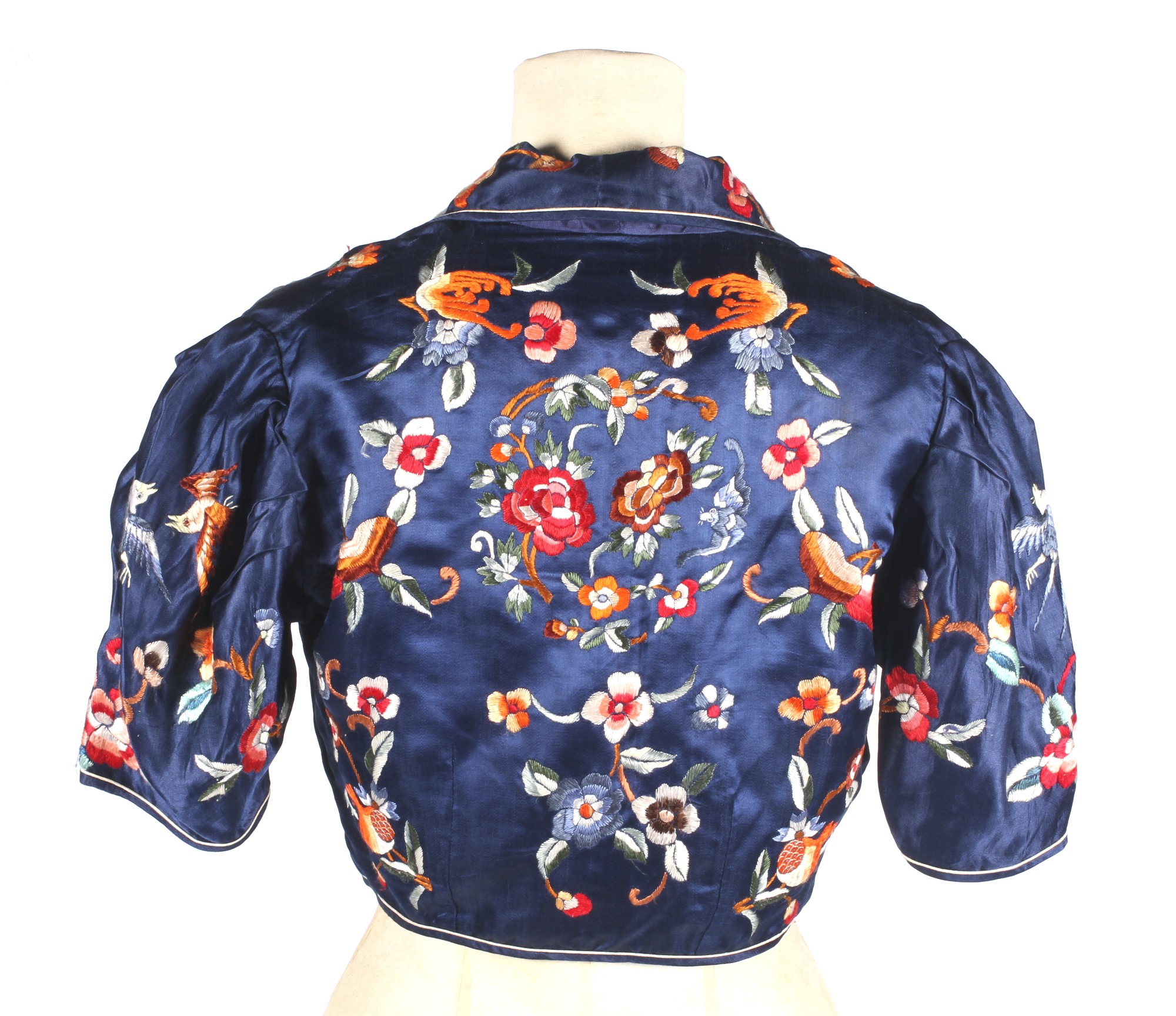 A 20th century Asian hand stitched bolero. With short sleeves, a long collard and single fastening. - Image 2 of 2