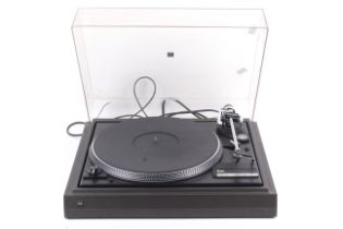 A vintage Dual CS 505-2 record deck turn table. With an Ortofon 10 cartridge and plastic dust cover.