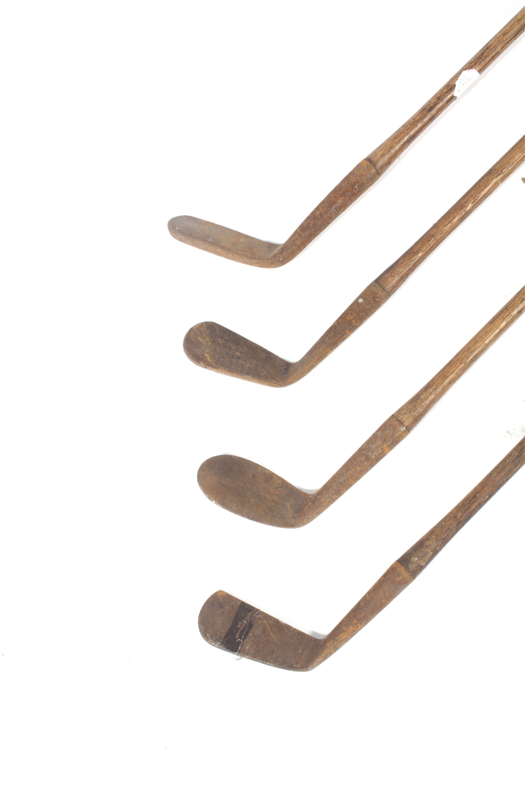 A collection of four Hickory golf clubs. - Bild 2 aus 2