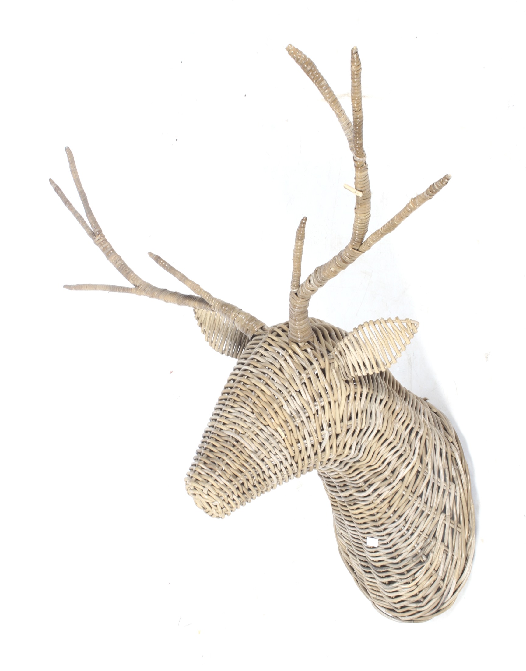 A wicker stag head with four prong antlers.