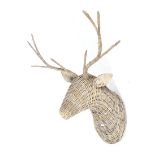A wicker stag head with four prong antlers.