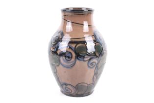 A Danico Danish studio pottery vase. With stylised floral decoration, impressed mark to base, #10.