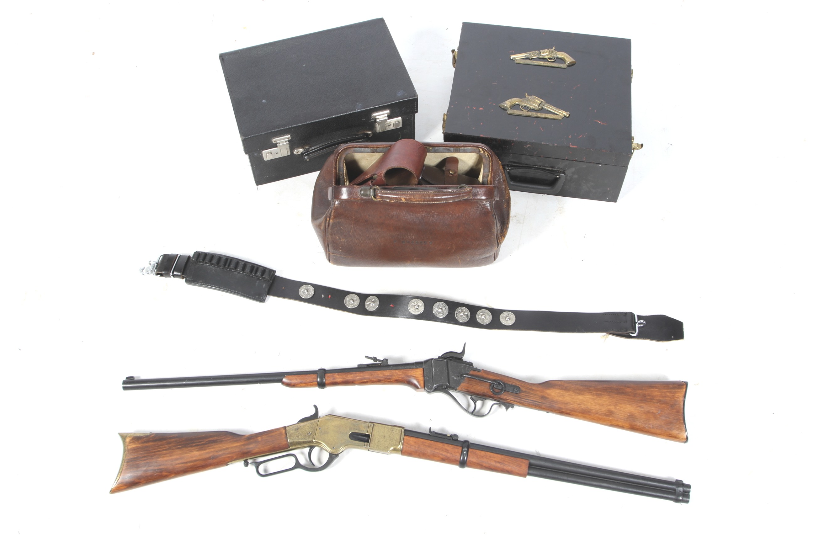 A collection of Wild West themed collectables including imitation rifles,