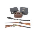 A collection of Wild West themed collectables including imitation rifles,