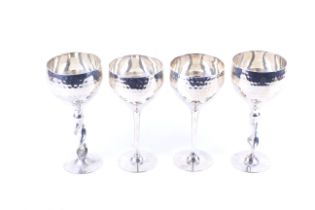 Two pairs of silver plated wine goblets, possibly Spanish. One pair with twisted stems.