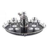 Art Deco EPNS cocktail set. Including shaker, six cocktail goblets and a black glass oval tray. Max.