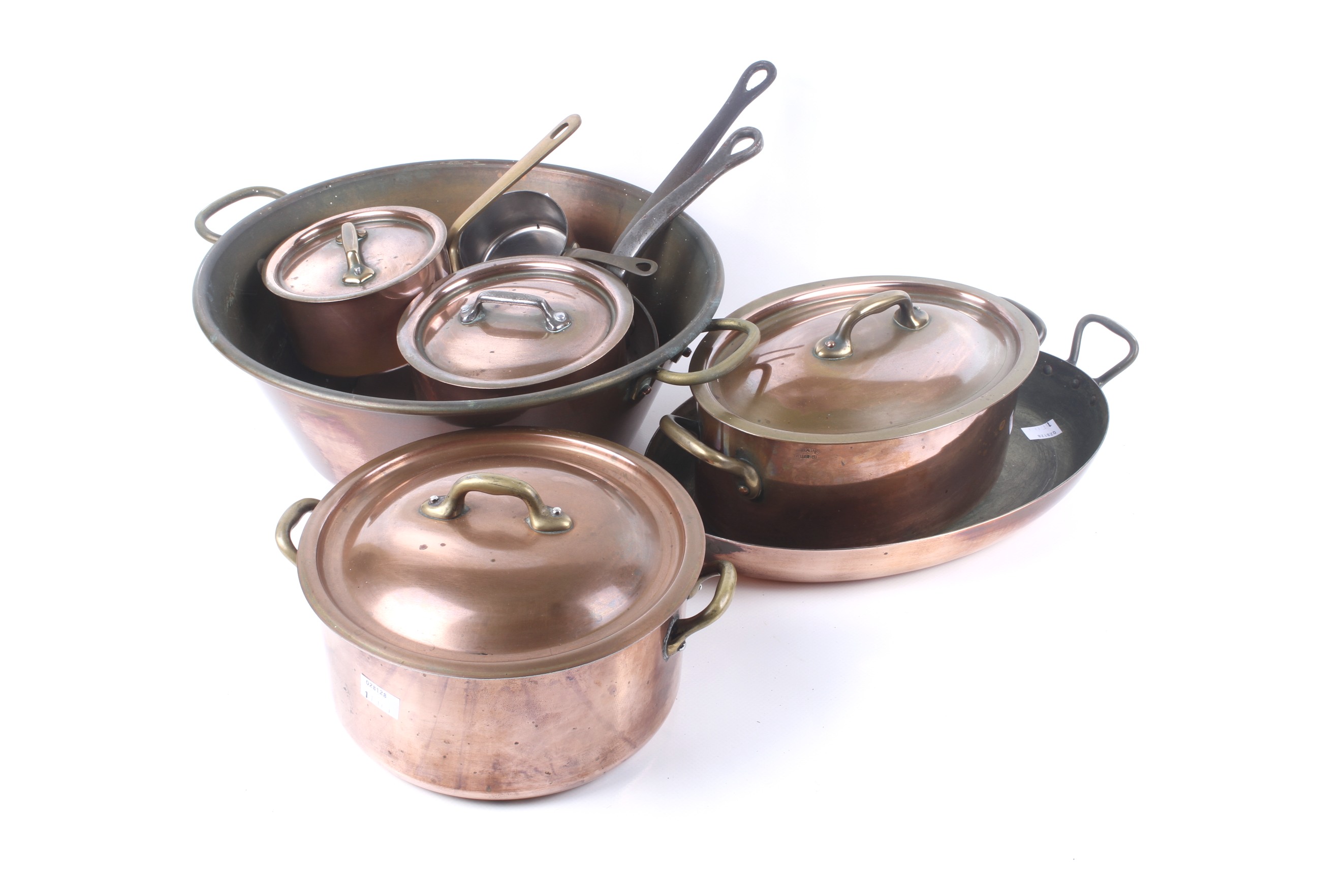 A collection of French copper cooking pans.