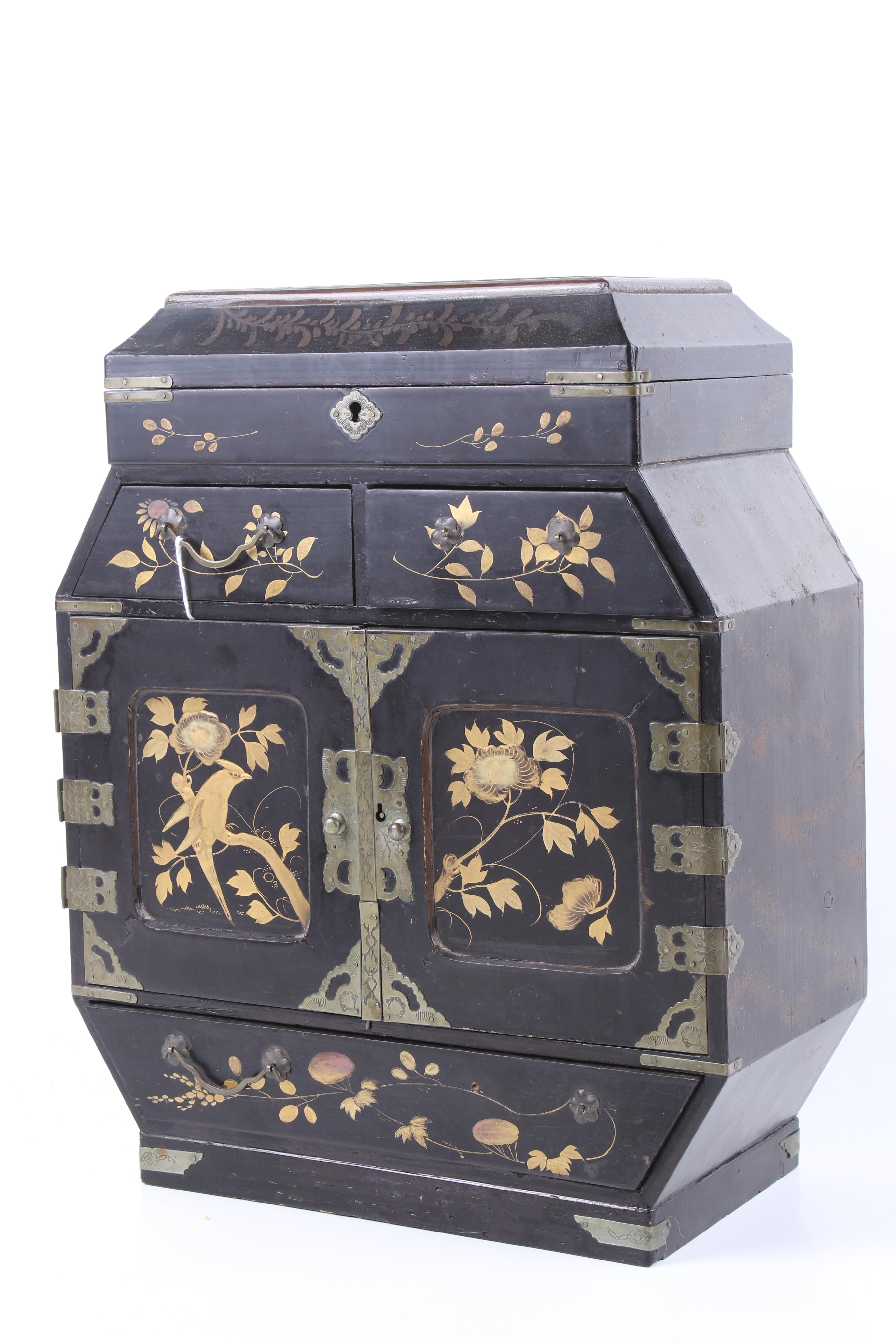 A late 19th century Japanese Aesthetic Movement black lacquered collector's cabinet.