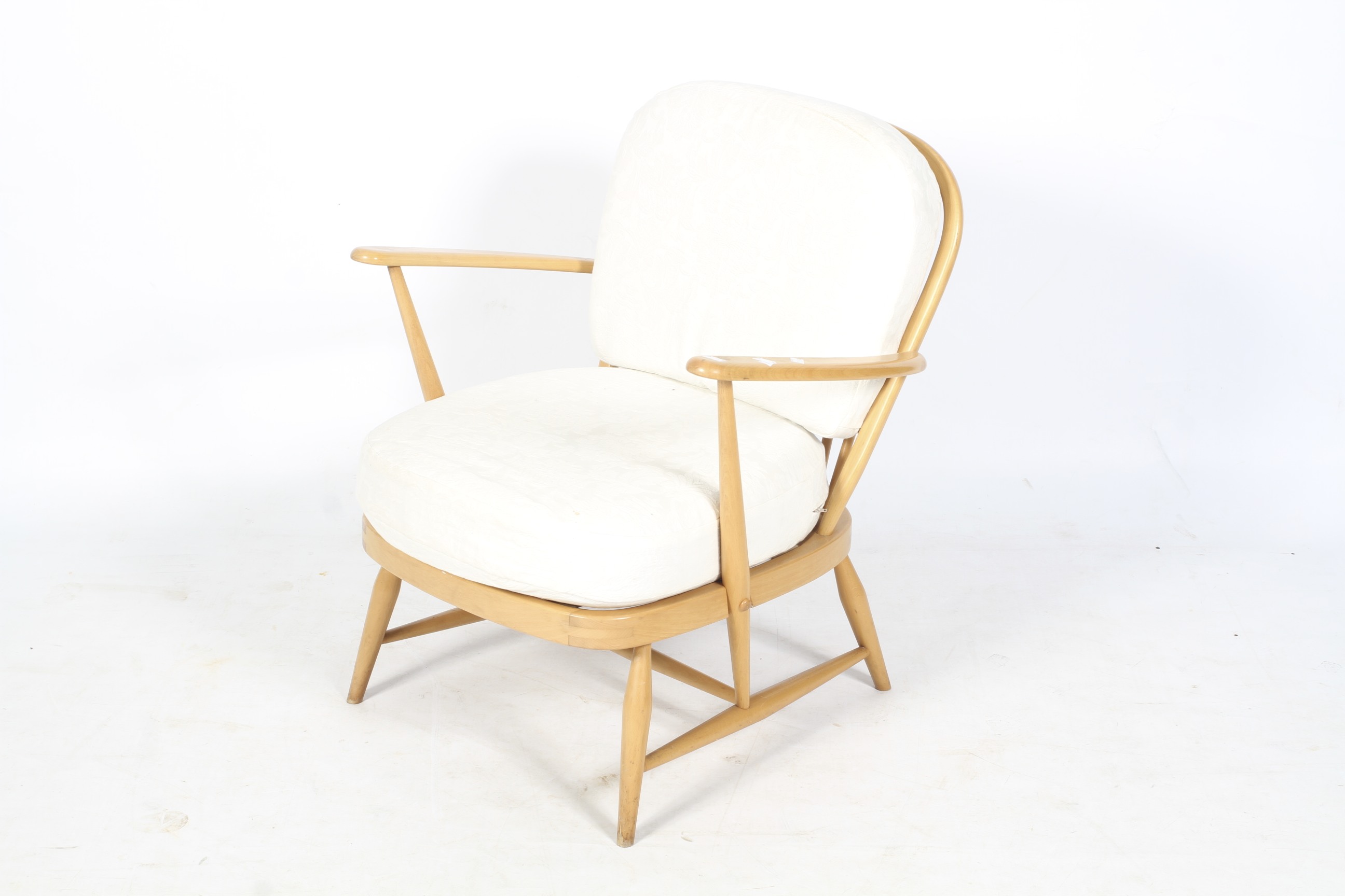 A circa 1980 Ercol 334 Windsor easy open arm chair.