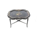 A Victorian black lacquer table.