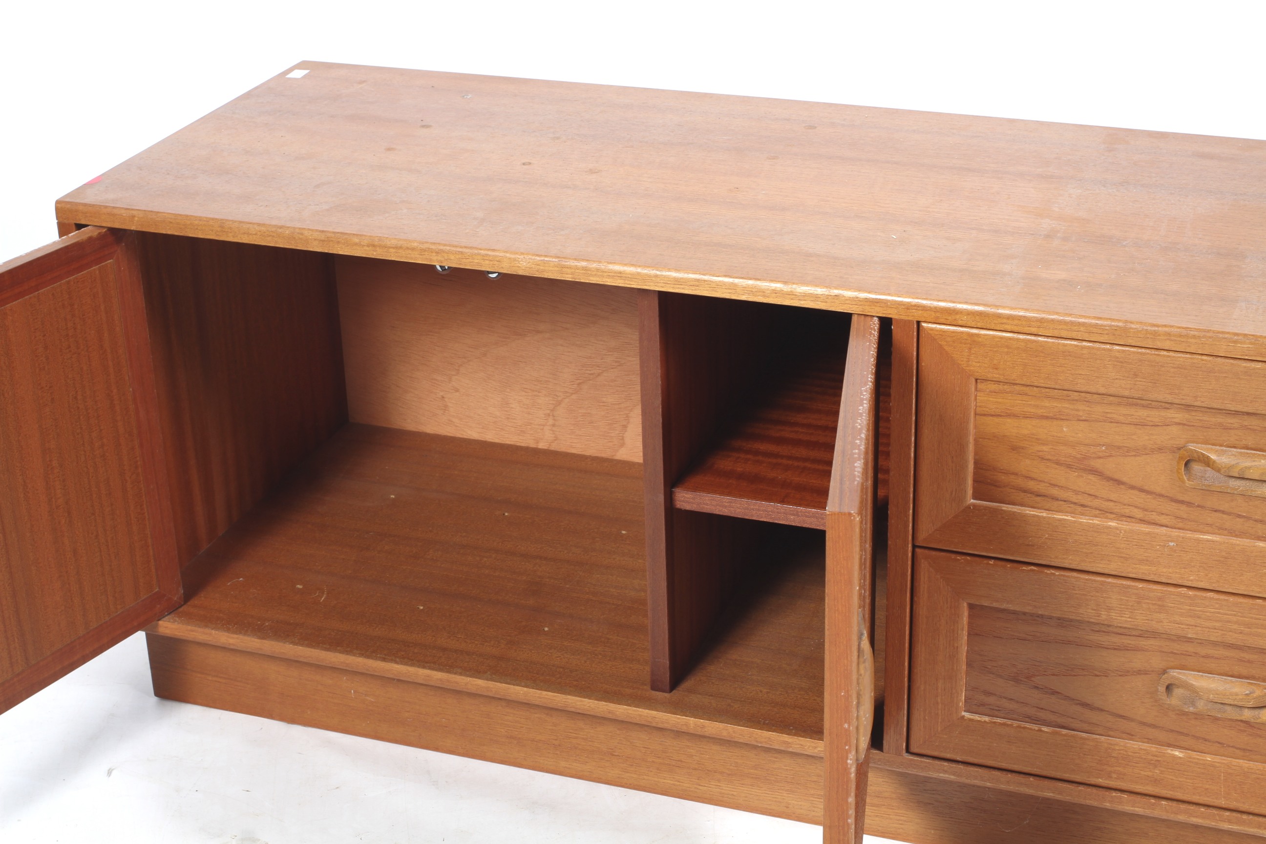 A low teak G Plan sideboard. With two drawers and double doors, with gold on red G Plan label. - Image 2 of 2