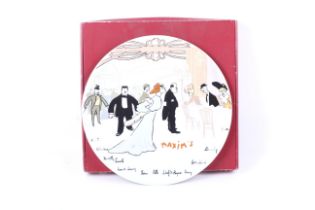 A Maxim's De Paris plate. Decorated with a scene of wealthy individuals socialising. Diameter 30.