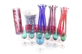 A collection of contemporary glassware and a Delft vase.