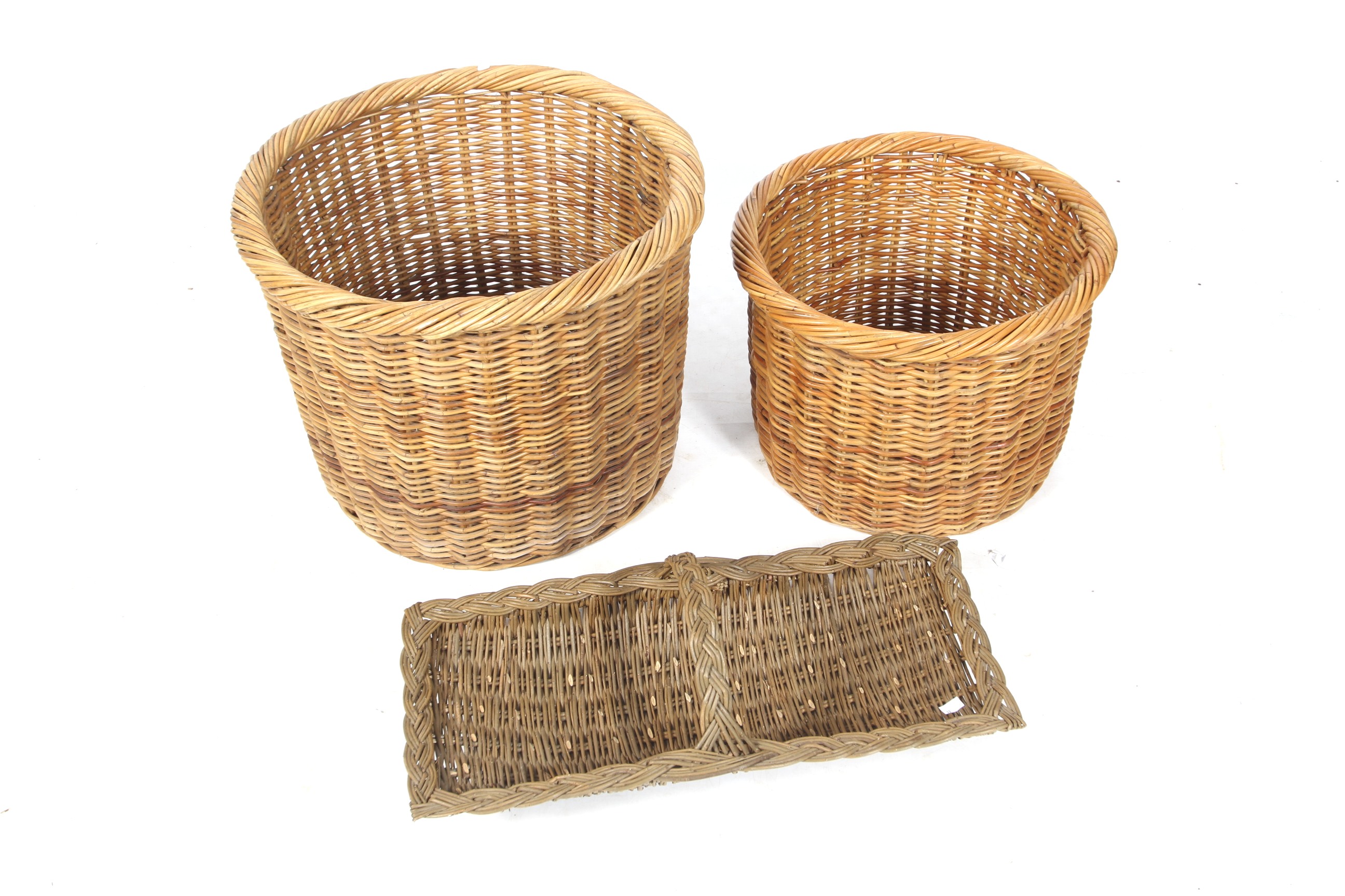 Three items of wicker. Comprising two cylindrical baskets, Max.