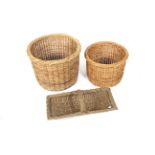 Three items of wicker. Comprising two cylindrical baskets, Max.