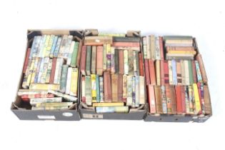 A large collection of vintage novel books.