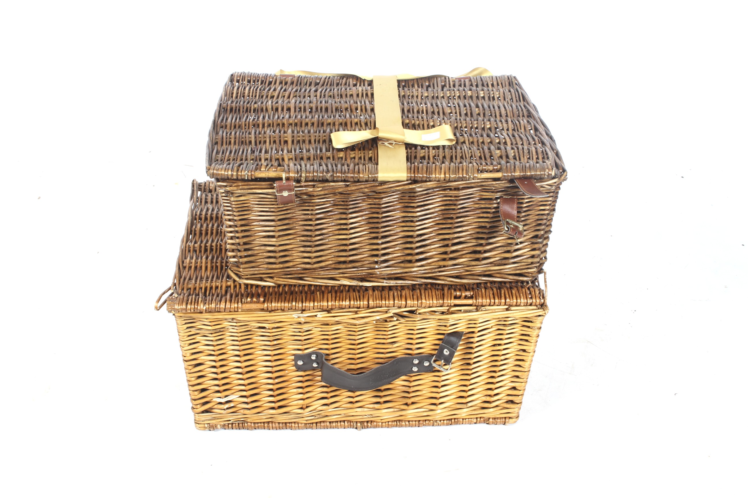 Two wicker picnic hampers.