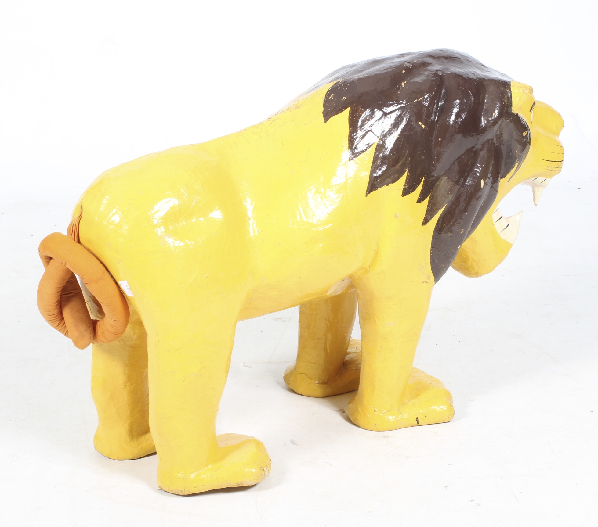 A large painted papier mache lion. WIth open jaws, standing square, with a stuffed fabric tail. - Image 2 of 2