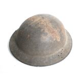 A WWII British Army Home Front helmet, dated 1941.