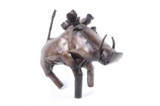 A contemporary sculpture of a warthog. Constructed of various metal plates, unsigned.