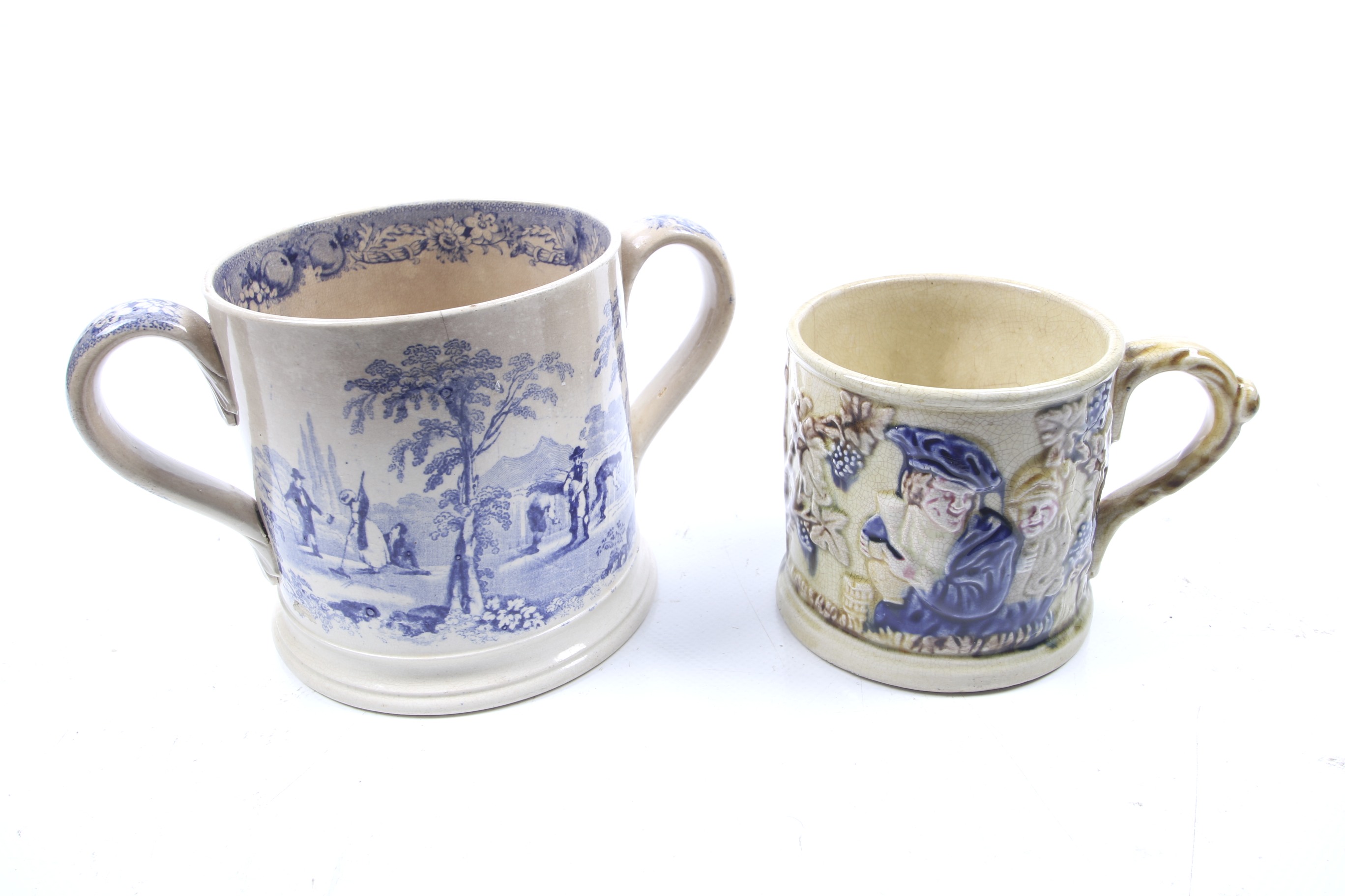 A 19th century Staffordshire pottery loving cup and a frog mug.