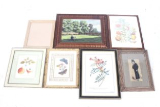 A collection of six assorted pictures and an empty frame.
