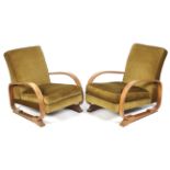 A pair of 1930s tank armchairs.