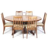 A mid-1970s G-Plan Fresco oval extending dining table and six chairs.