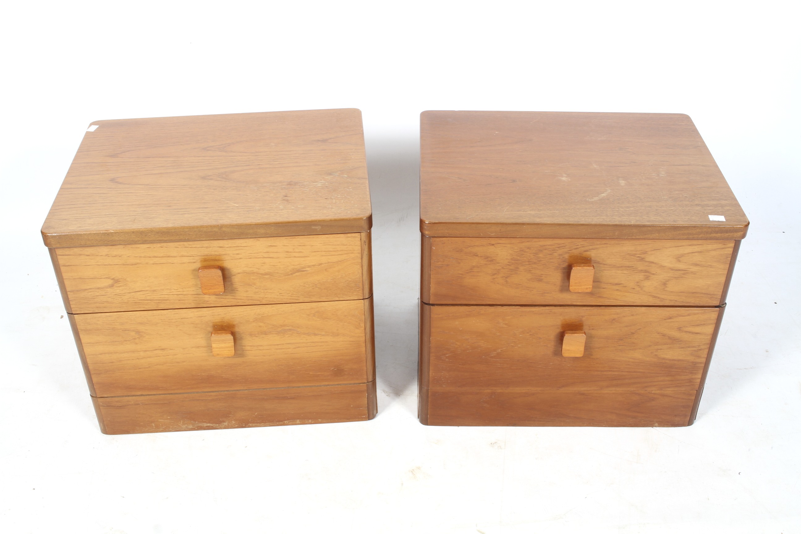 A pair of Stag bedside cabinets.