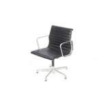 After Charles and Ray Eames, a low back swivel office chair.