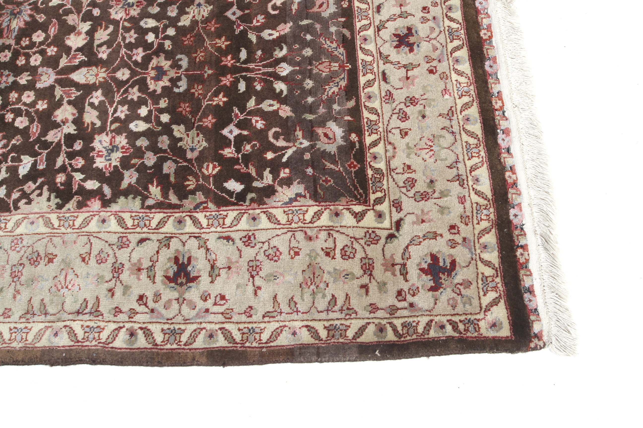 A Persian Tabriz brown ground wool rug with cream decoration. - Image 2 of 3