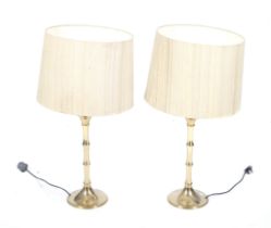 A pair of Ingo Maurer table lamps.