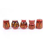 A collection of five small modern Poole Pottery Delphis vases. Various shapes. Max.