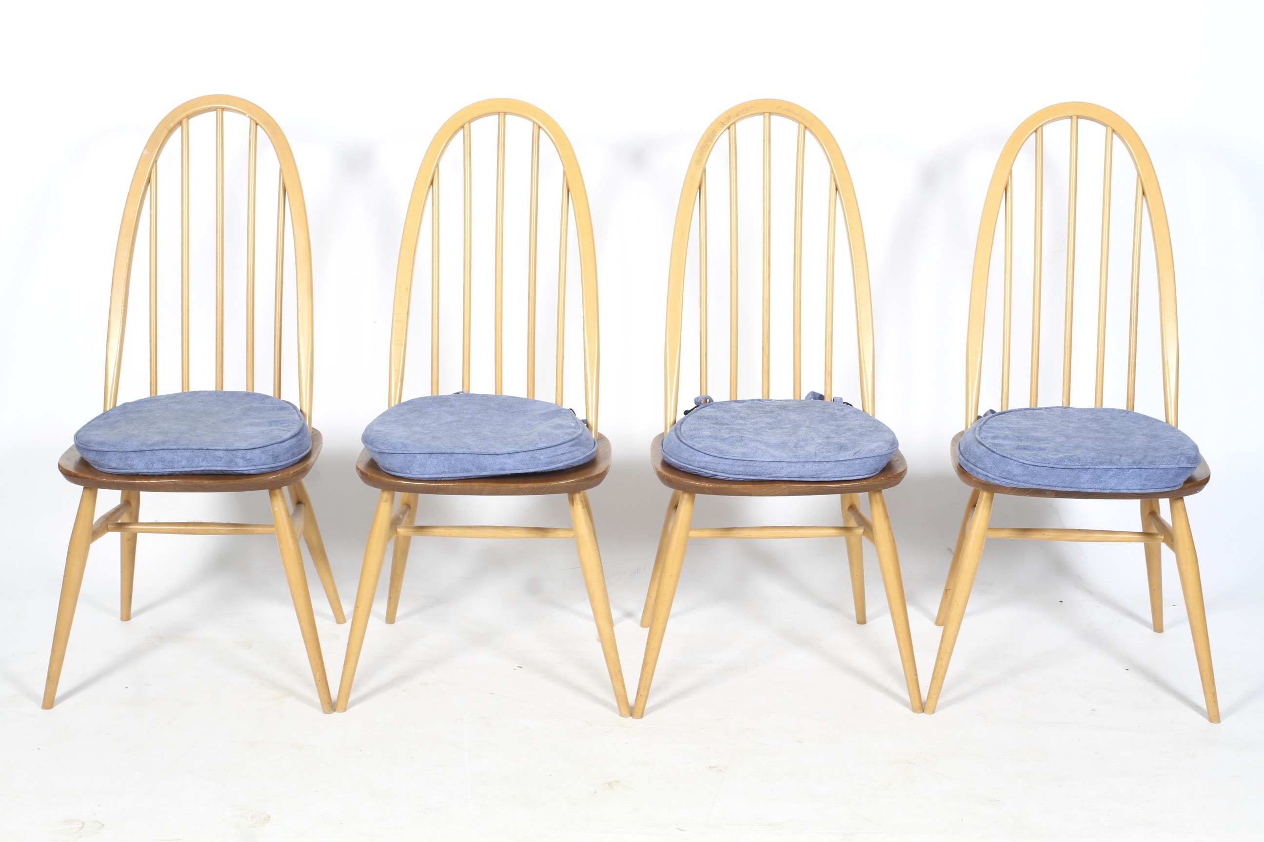 Four circa 1978 Ercol Windsor 365 blonde elm hoop back chairs.