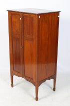 A 19th century mahogany inlaid cupboard.