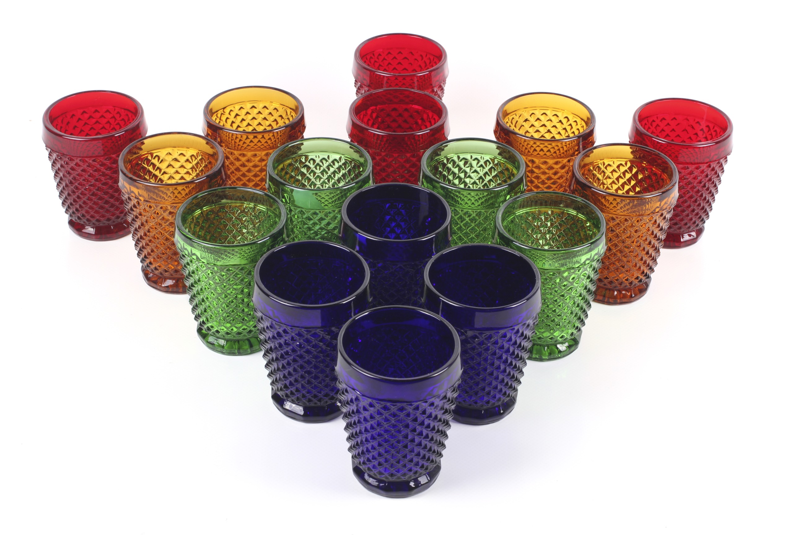 A set of sixteen glass beakers.