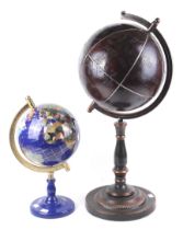 Two contemporary terrestrial globes.