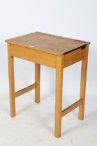 A vintage Marmet elm school desk.