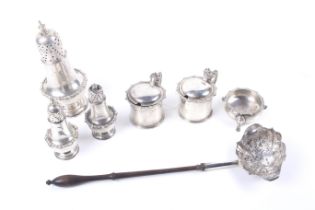 A late George II toddy ladle and a silver six piece cruet set.