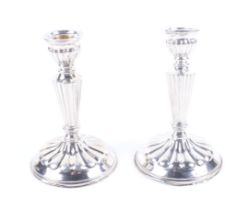 A pair of Spanish short round candlesticks signed Pedro Duran.