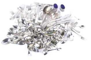 A collection of assorted silver plated flatware and cutlery.