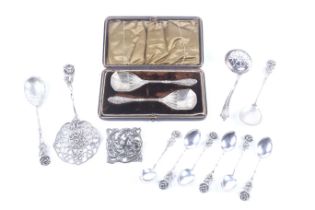 A small collection of silver plated items including a pair of Continental jam spoons.