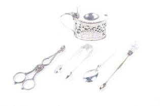A small collection of silver to include a pierced oval mustard pot.