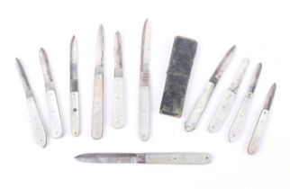 Eleven Victorian and later silver and mother of pearl handled pocket folding fruit knives.