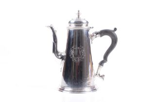 A George II silver straight tapering coffee pot.