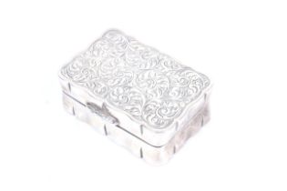 A vintage silver shaped-rectangular snuff box.