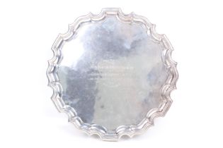 A silver shaped-round salver.